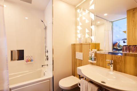 Room, 2 Double Beds | Bathroom | Rainfall showerhead, free toiletries, hair dryer, towels