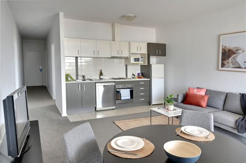 One Bedroom Deluxe Apartment | Private kitchen | Full-size fridge, microwave, oven, stovetop