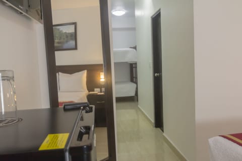 Family Quadruple Room, 2 Bedrooms | Minibar, in-room safe, free WiFi, bed sheets