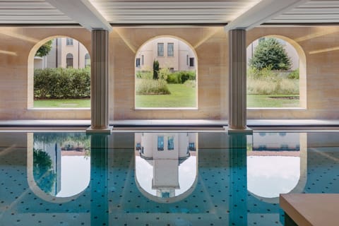 Indoor pool, open 7:00 AM to 10:00 PM, sun loungers