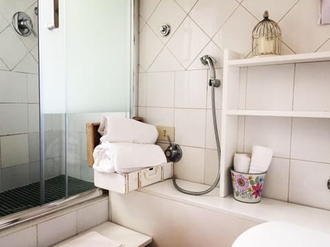 Luxury Triple Room, Terrace | Bathroom | Shower, rainfall showerhead, designer toiletries, hair dryer