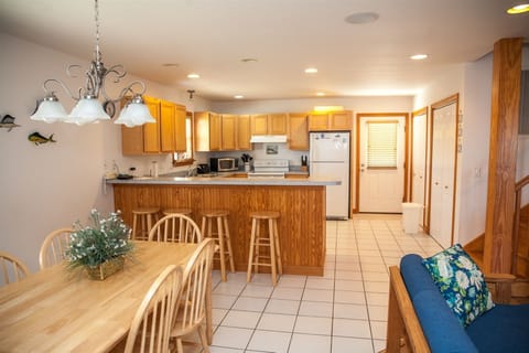 Cottage, 3 Bedrooms | Private kitchen | Full-size fridge, microwave, stovetop, coffee/tea maker