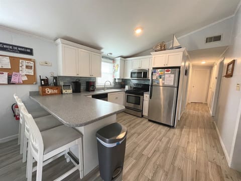 Cottage, 3 Bedrooms | Private kitchen | Full-size fridge, microwave, stovetop, dishwasher