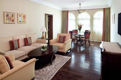 Suite, 1 Bedroom | Living area | LCD TV