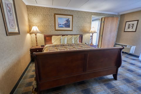 River-view Room, King Suite with Jetted tub and Balcony | In-room safe, desk, laptop workspace, soundproofing