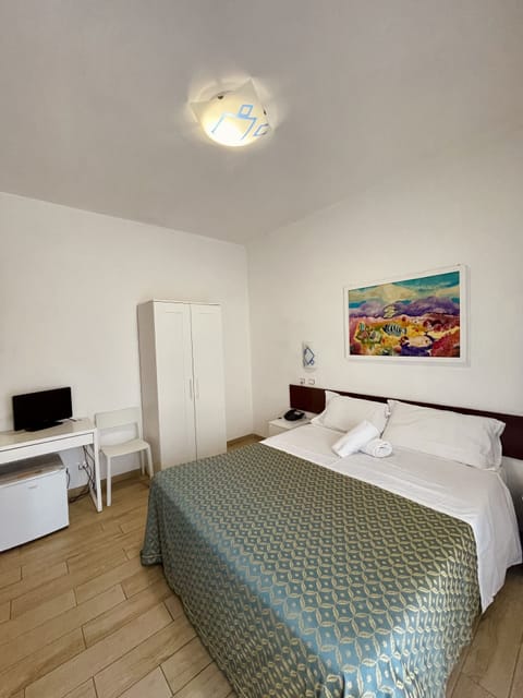 Double Room, Balcony | Minibar, desk, iron/ironing board, rollaway beds