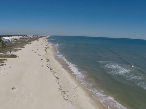 On the beach, white sand, beach towels