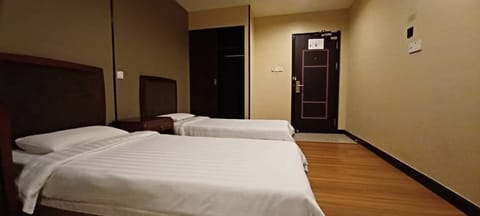 Economy Twin Room, 2 Twin Beds | Blackout drapes, iron/ironing board, free WiFi, bed sheets