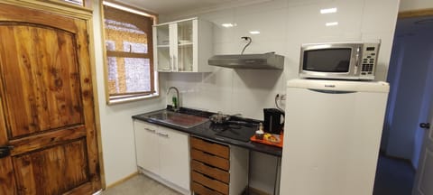 Comfort Apartment, Private Bathroom | Private kitchen | Microwave, stovetop, cookware/dishes/utensils