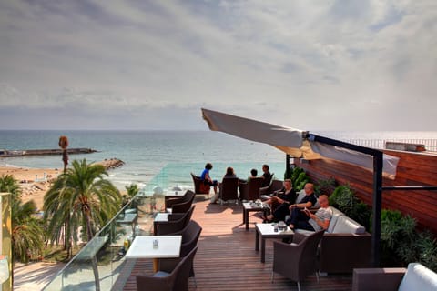 Rooftop bar, ocean views, open daily