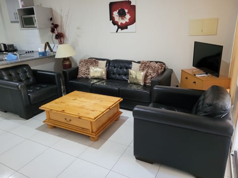 Standard Apartment, 2 Bedrooms | Living area | 30-inch flat-screen TV with digital channels, TV