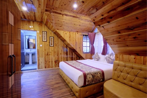 Attic Chalet,Hill View | Premium bedding, down comforters, memory foam beds, in-room safe