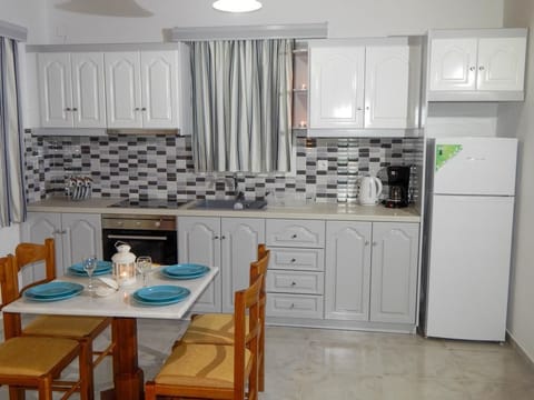 Superior Apartment, 1 Bedroom, Sea View | Minibar, in-room safe, soundproofing, iron/ironing board