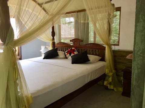 Deluxe Cottage, Garden View | Premium bedding, desk, iron/ironing board, rollaway beds