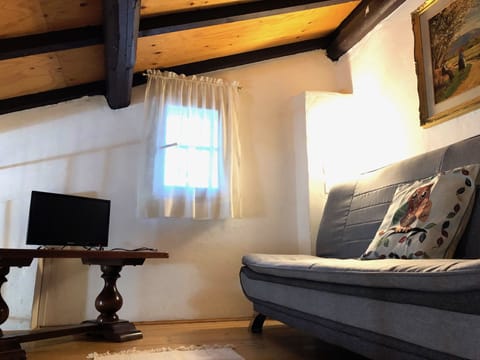 Romantic Duplex, 1 Queen Bed, Kitchenette, Ground Floor | Living room | Flat-screen TV