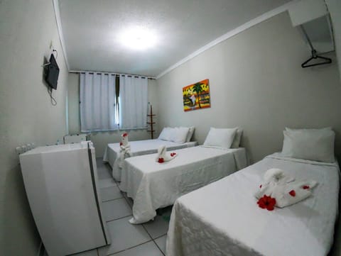 Standard Triple Room | Minibar, desk, blackout drapes, free WiFi