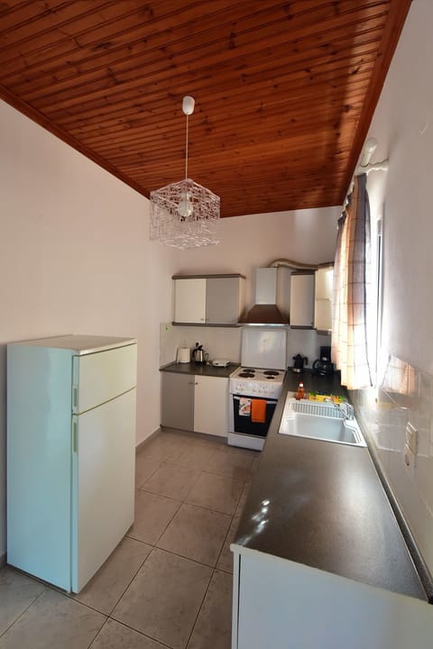 Villa, 1 Bedroom (Yellow) | Private kitchen | Full-size fridge, oven, stovetop, coffee/tea maker