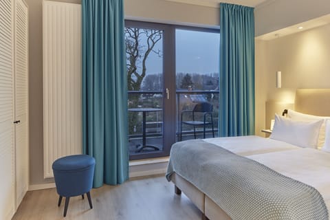 Double Room (Die Lütten Landblick) | Hypo-allergenic bedding, minibar, in-room safe, individually decorated