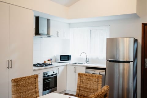 Self Contained Apartment #7 Top Floor | Private kitchen | Full-size fridge, oven, stovetop, dishwasher