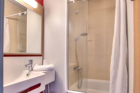 Shower, towels, soap, shampoo