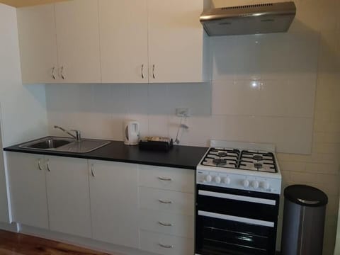 Apartment, 2 Bedrooms | Private kitchen | Fridge, microwave, coffee/tea maker, electric kettle