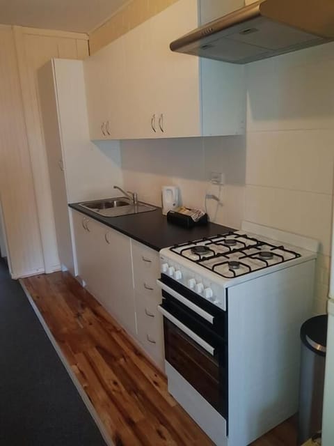 Apartment, 2 Bedrooms | Private kitchen | Fridge, microwave, coffee/tea maker, electric kettle