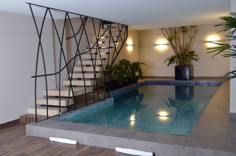 Indoor pool, sun loungers