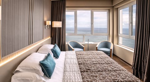 Standard Room, 2 Twin Beds, Sea View | Minibar, in-room safe, desk, blackout drapes