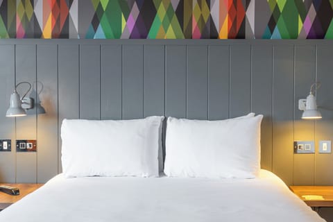 Desk, laptop workspace, blackout drapes, iron/ironing board