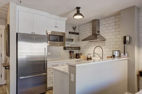 Studio | Private kitchen | Full-size fridge, microwave, oven, stovetop