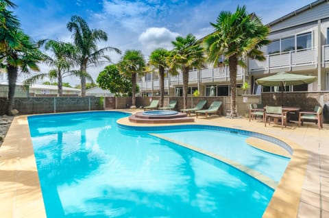 Outdoor pool, pool umbrellas, sun loungers