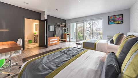 Deluxe Room, 2 Queen Beds, Balcony | Premium bedding, down comforters, in-room safe, individually furnished