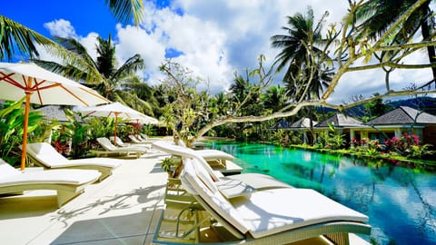 Outdoor pool, pool umbrellas, sun loungers