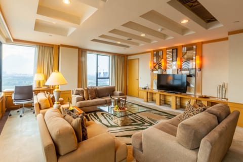 Presidential Suite, 1 King Bed, River View | Living room | 49-inch LCD TV with cable channels, TV