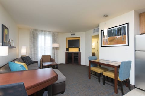 Suite, 1 Bedroom | Living area | 38-inch LCD TV with cable channels, TV, Netflix