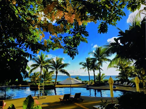 Indoor pool, seasonal outdoor pool, pool umbrellas, sun loungers