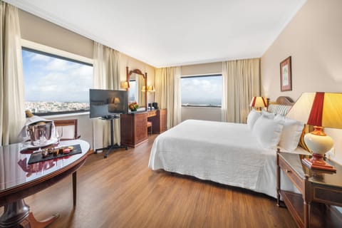 Superior Double or Twin Room, River View | Minibar, in-room safe, desk, blackout drapes