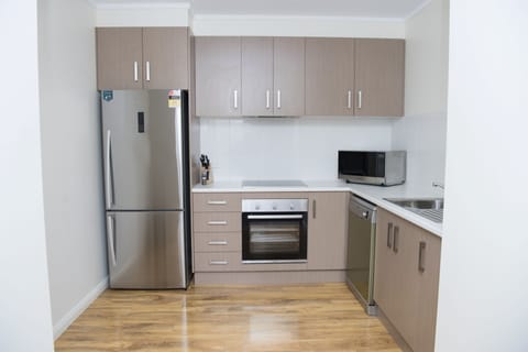 Family Junior Suite | Private kitchenette | Microwave, coffee/tea maker, electric kettle