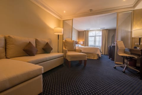 Junior Suite, 1 King Bed | Premium bedding, pillowtop beds, minibar, in-room safe