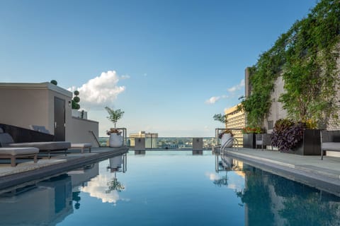 Seasonal outdoor pool, a heated pool, sun loungers