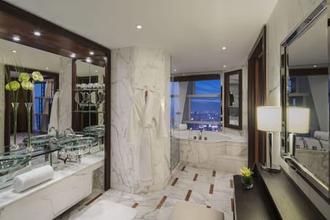 Separate tub and shower, deep soaking tub, hair dryer, bathrobes