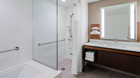 Room, 1 King Bed, Accessible, Corner (Roll-in Shower) | Bathroom | Combined shower/tub, free toiletries, hair dryer, towels