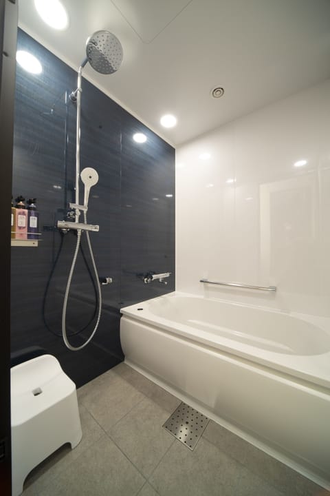 Triple Room , Non smoking(28 square) | Bathroom | Deep soaking tub, free toiletries, hair dryer, slippers