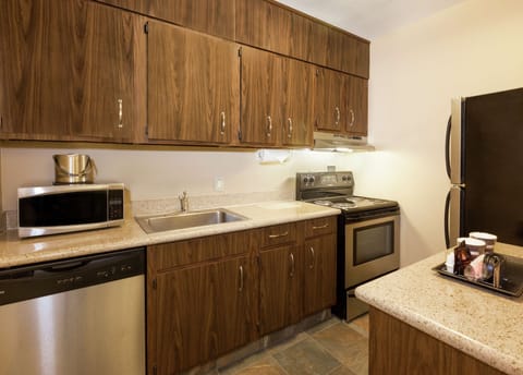 Suite, 1 King Bed, Accessible, Bathtub | Private kitchen | Fridge, oven, coffee/tea maker, cookware/dishes/utensils