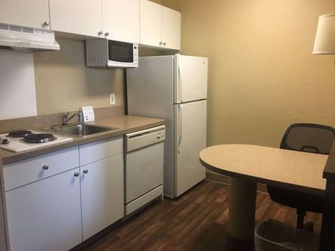 Studio, 1 Queen Bed, Non Smoking | Private kitchen | Full-size fridge, microwave, stovetop, dishwasher