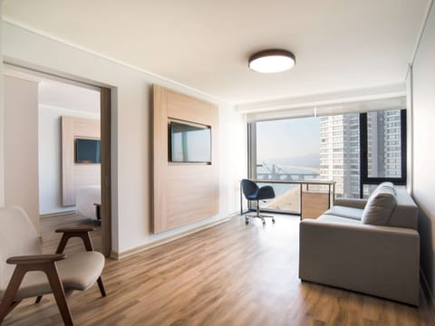 Superior Suite, Bay View | Minibar, in-room safe, desk, laptop workspace