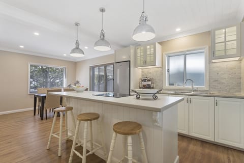 Waterfront Hamptons Style Holiday Home | Private kitchen | Full-size fridge, microwave, oven, stovetop