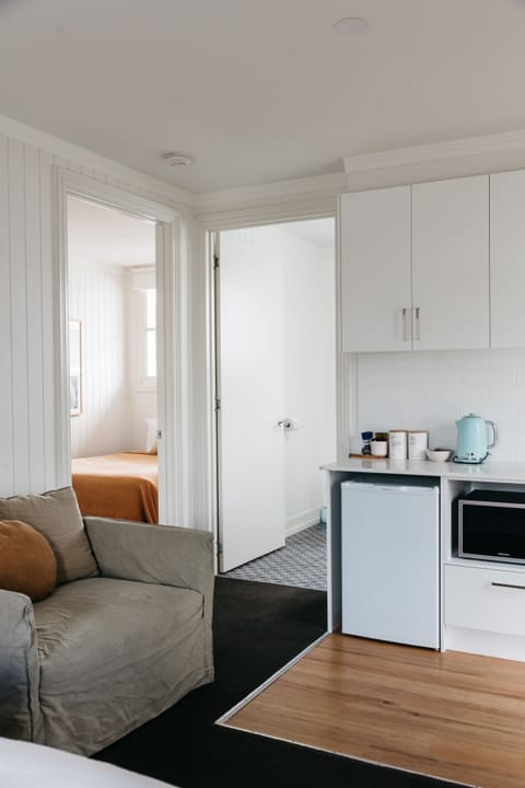 Room 1 - Torquay 2 Bedroom Studio | Private kitchenette | Fridge, microwave, coffee/tea maker, electric kettle