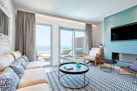 Duplex, Sea View (Cliff Suite) | Living area | Flat-screen TV, iPod dock, toys, MP3 dock