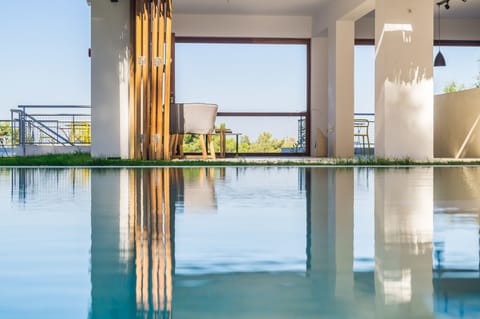 Outdoor pool, pool umbrellas, sun loungers